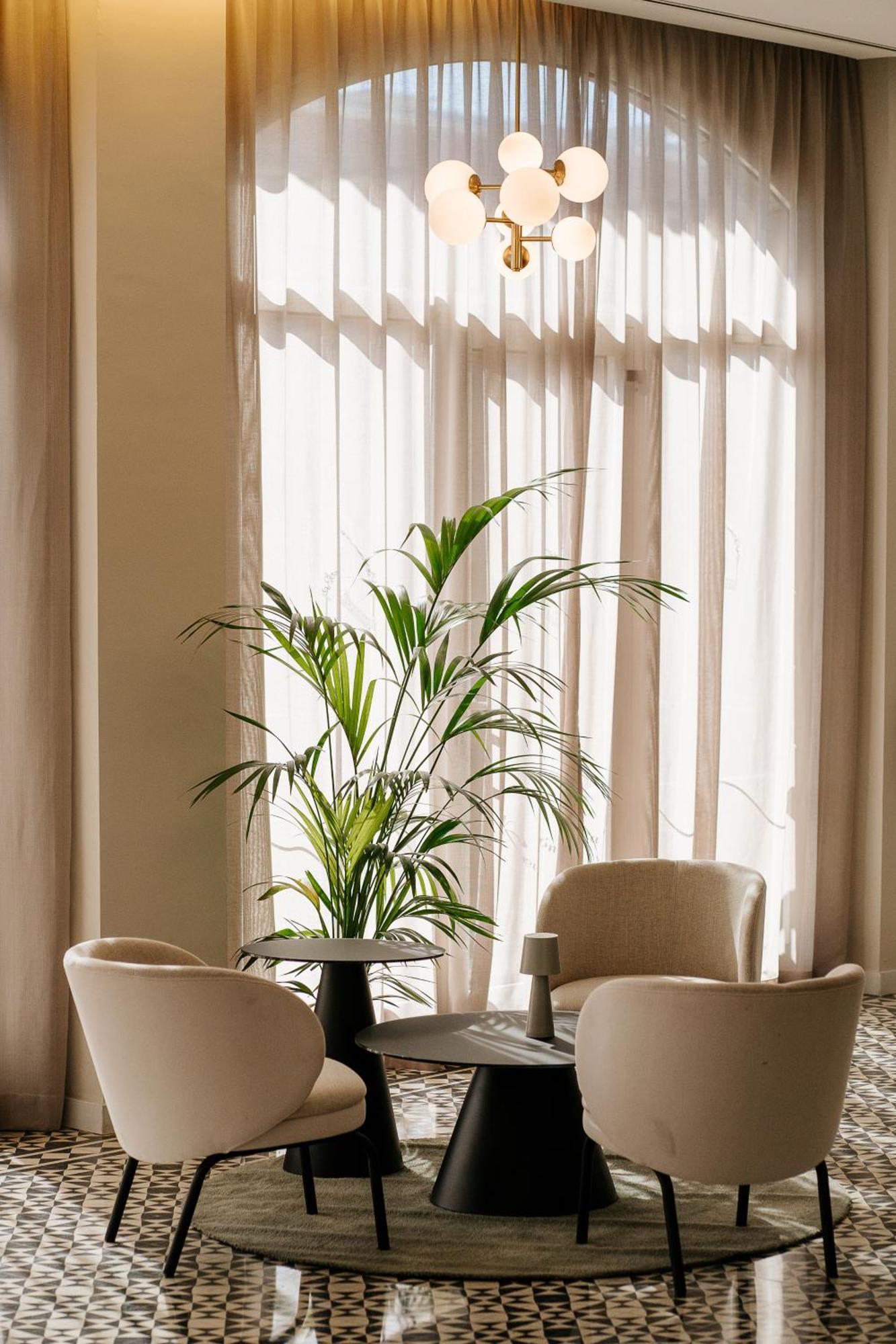 לוס כריסטיאנוס Hotel Reveron Plaza מראה חיצוני תמונה